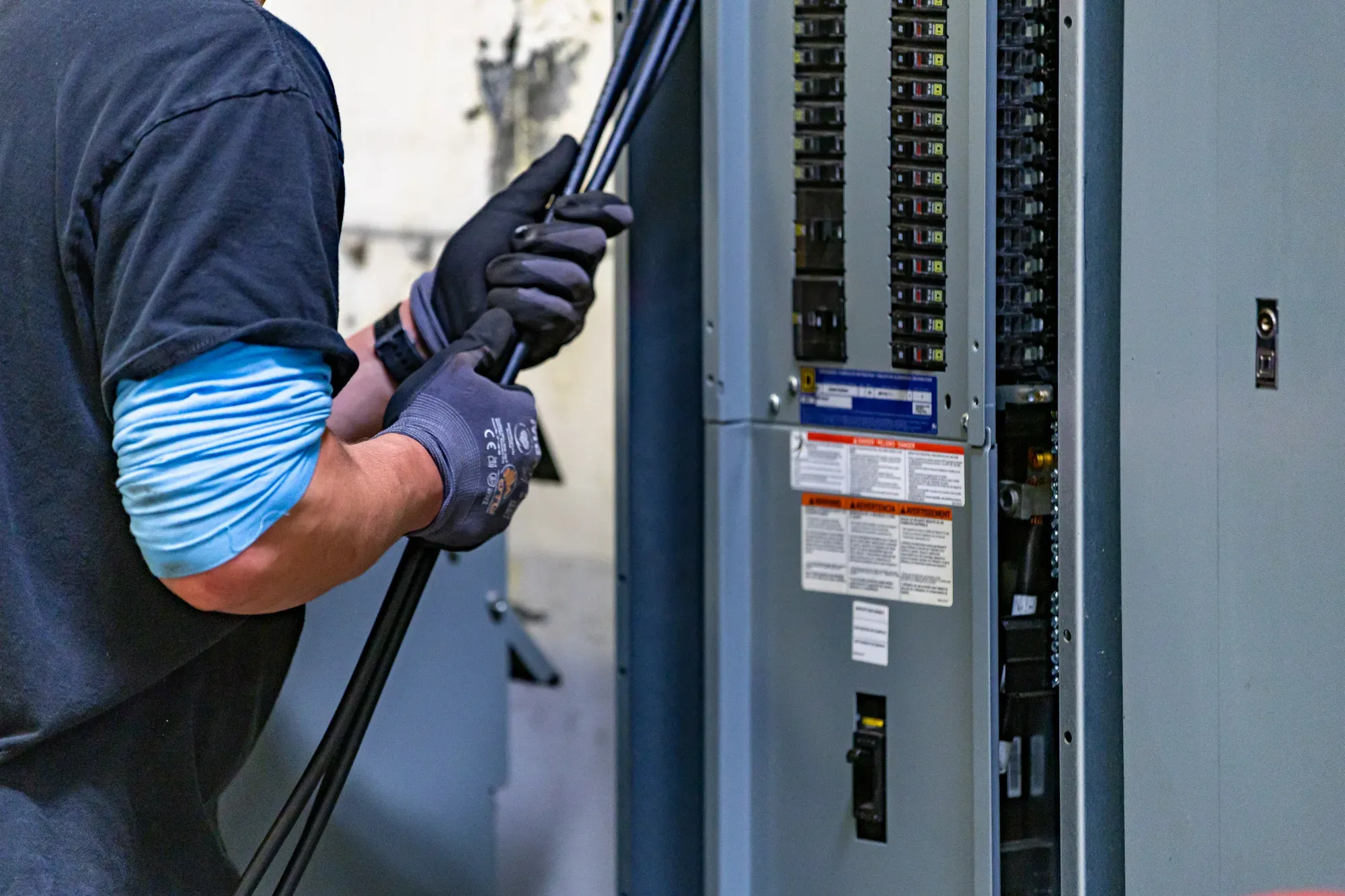 Commercial electrician wiring electrical panel