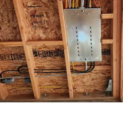 Electrical panel installation during new construction framing