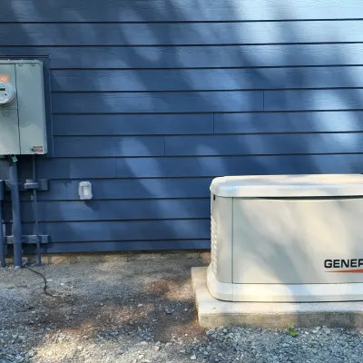 Generac whole-home generator on concrete pad