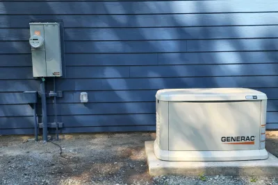 Standby whole-house generator installed on the side of a home in Snohomish County