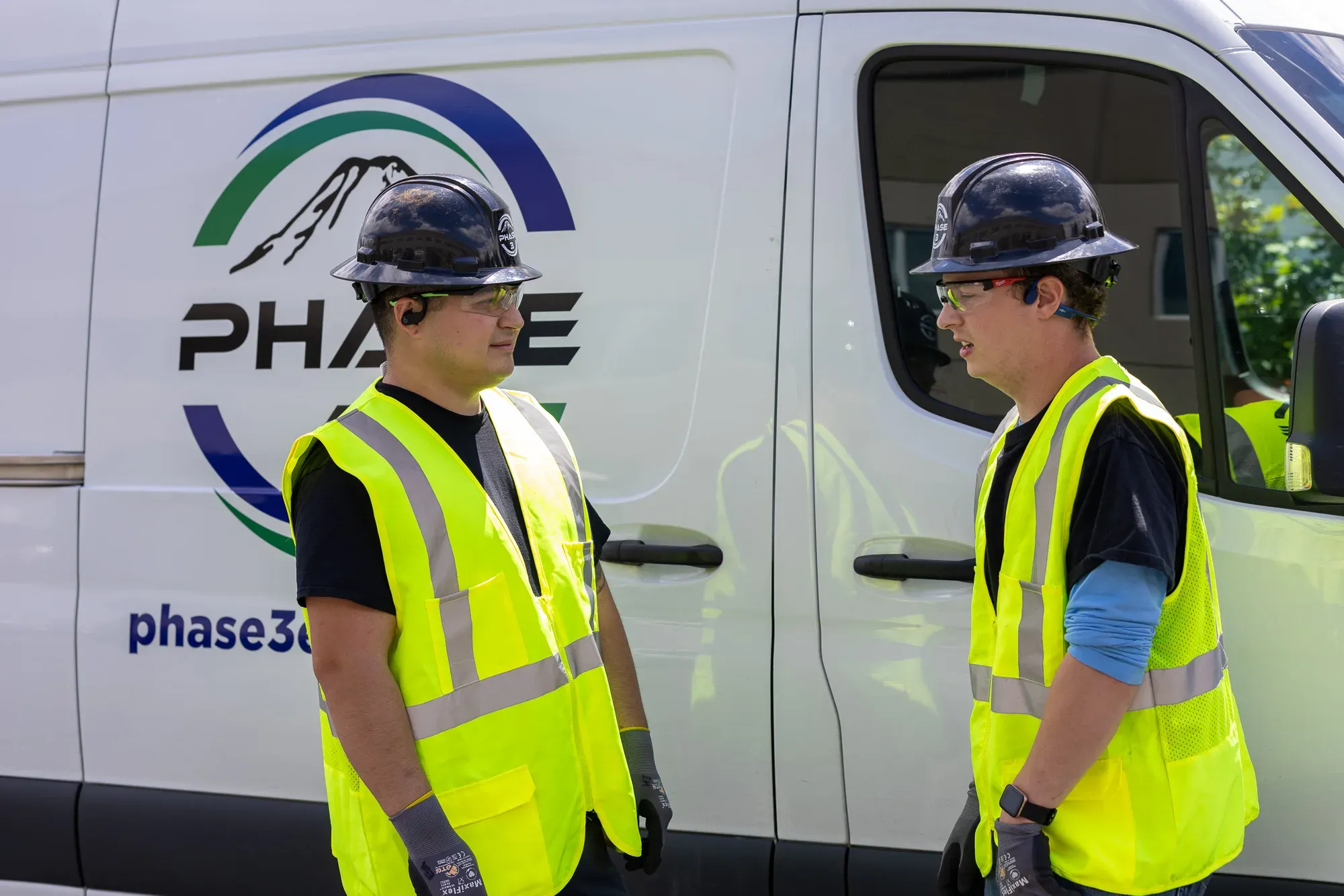 Phase 3 Electric branded service van at a Monroe, WA jobsite