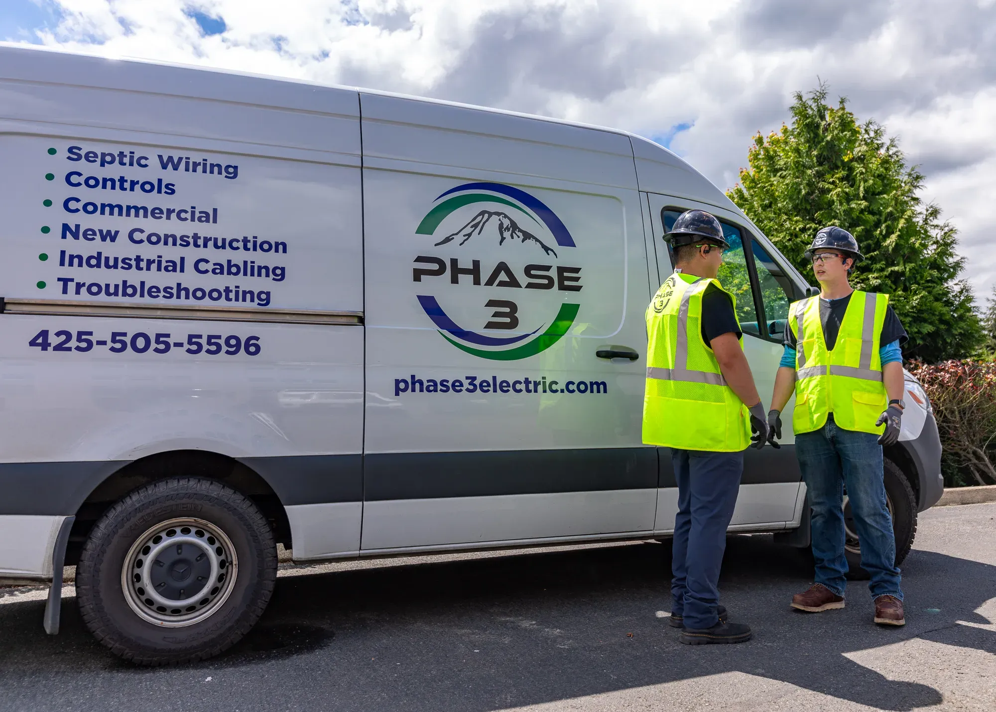 Phase 3 Electric team arriving at a commercial jobsite in Everett, WA