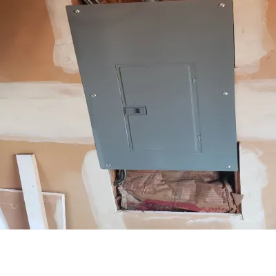 Residential electrical panel upgrade with finished drywall