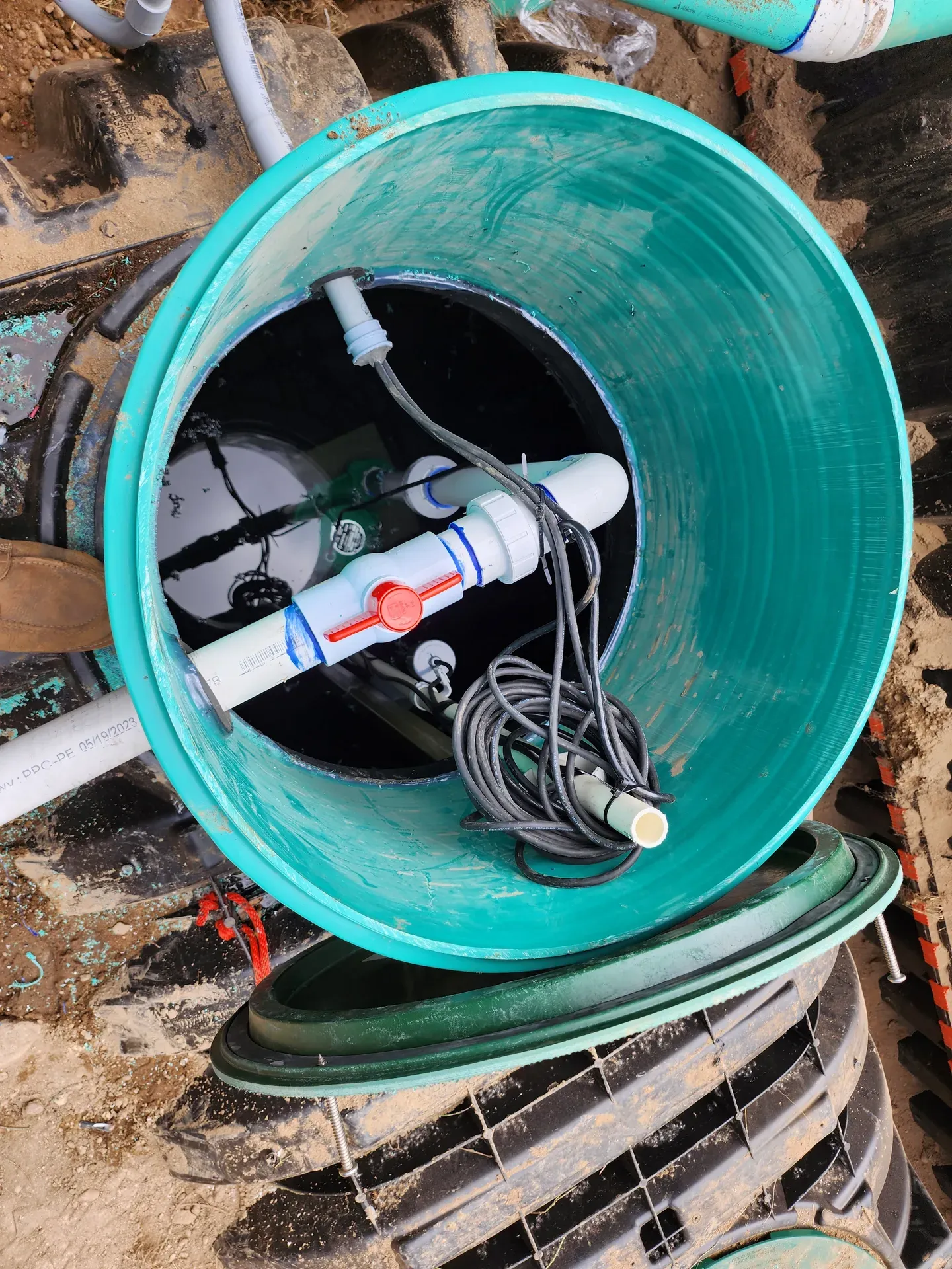 Septic pump chamber wiring and floats installation