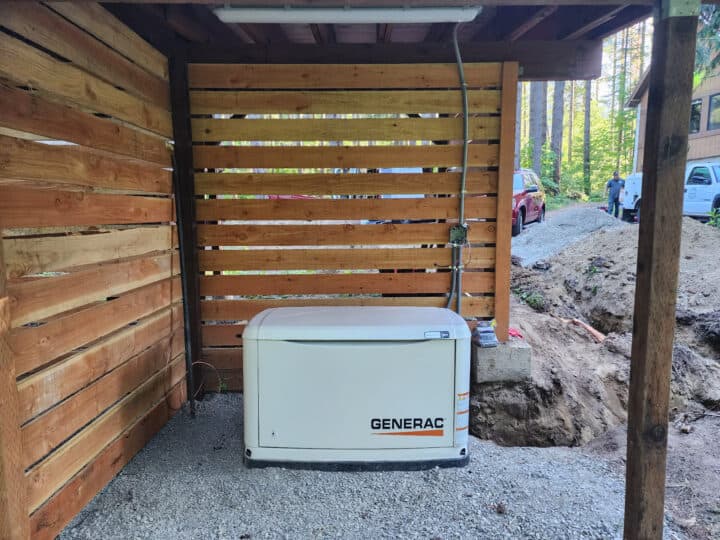 Generac generator in a wooden enclosure